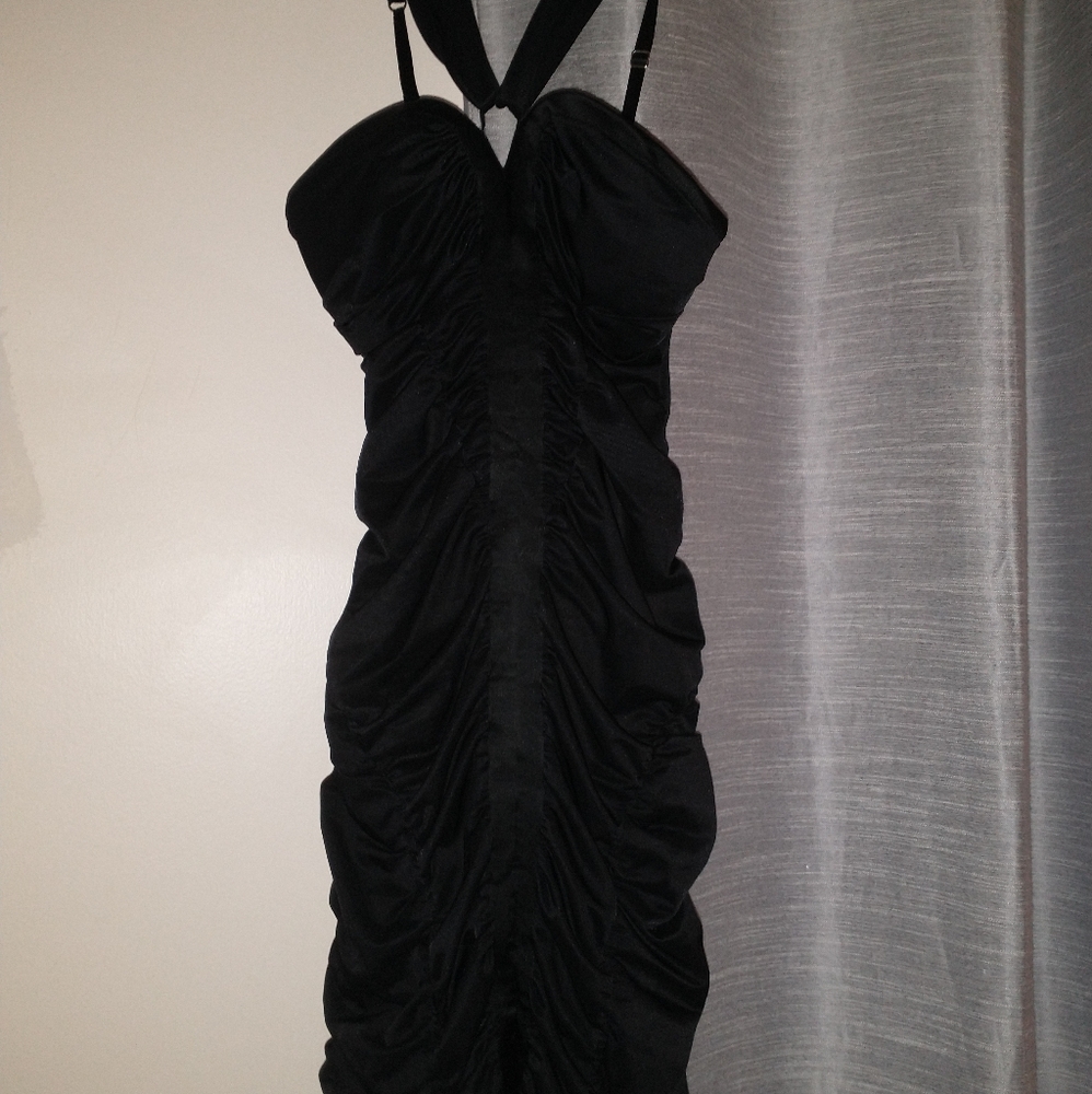 Bebe- tight fitting, rouched cocktail dress.